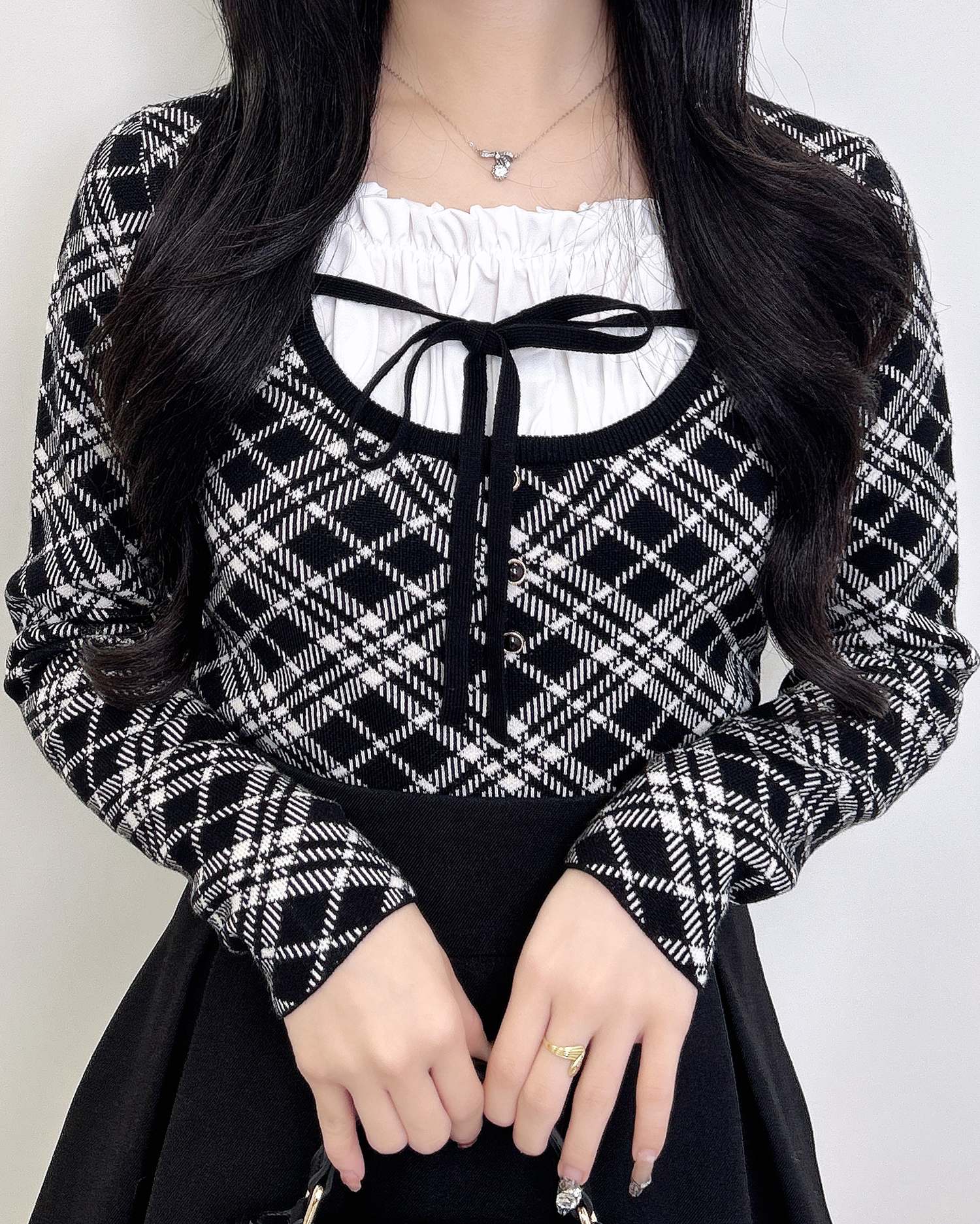 フロントフリルドッキングチェック柄ニット