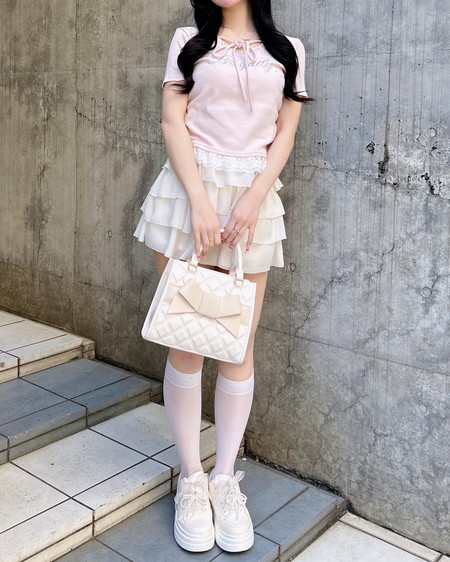 INGNI（イング） リボン付レース出しラインストーンロゴトップス ﾗｲﾄﾋﾟﾝｸ