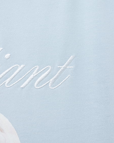 INGNI（イング） リボン付犬プリントTシャツ ｻｯｸｽ/ｵﾌﾎﾜｲﾄ